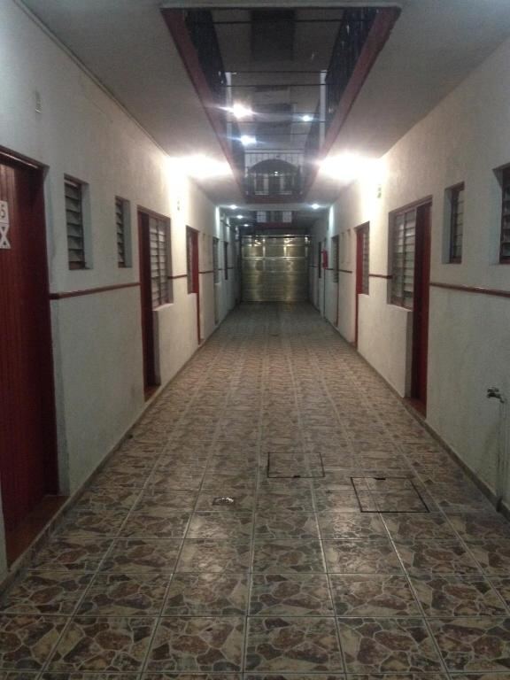 Corridor leading to the guest rooms at Hotel Xalapa