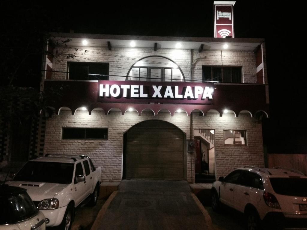 Entrance and illuminated sign of Hotel Xalapa in Veracruz